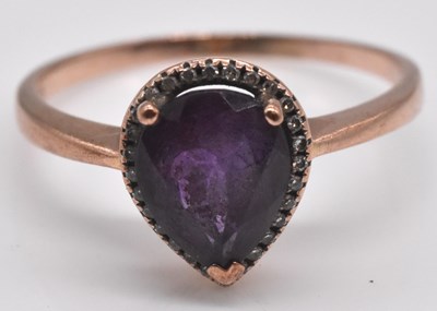 Lot 534 - A 9ct rose gold pear shaped dress ring, size S...