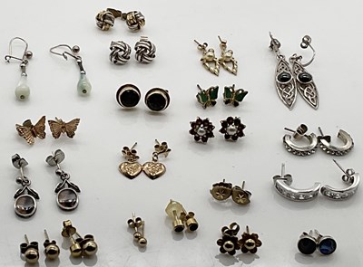 Lot 521 - A group of yellow metal and white metal ear...