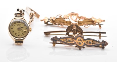 Lot 531 - Two 9ct yellow gold brooches, a yellow metal...