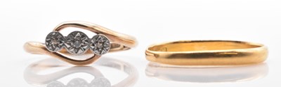 Lot 529 - A 22ct yellow gold wedding band, size N,...