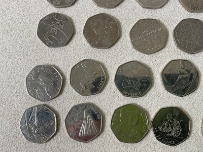 Lot 623 - A group of two pound coins (44), one pound...
