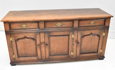 Lot 1078 - TITCHMARSH & GOODWIN; an oak sideboard, with...