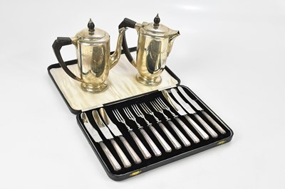 Lot 2301 - A hallmarked silver coffee pot and hot water...