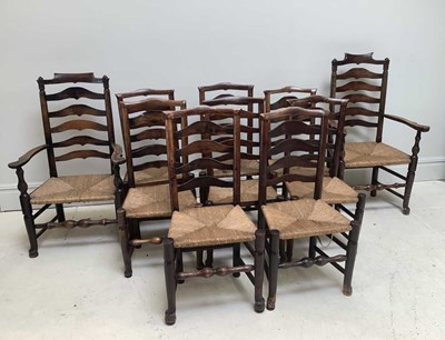 Lot 1063 - A set of ten 19th century oak ladder back...