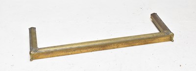 Lot 1579 - An Edwardian brass fire kerb fender, length...
