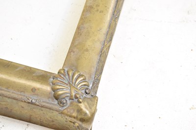 Lot 1579 - An Edwardian brass fire kerb fender, length...