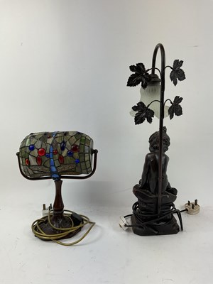 Lot 116 - Two decorative table lamps, one in a Tiffany...