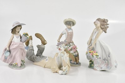 Lot 2478 - LLADRO; four ceramic figures, comprising...