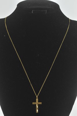 Lot 1298 - A small 9ct gold cross pendant, length 2.8cm,...