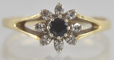 Lot 1246 - A 9ct gold diamond and sapphire floral set...