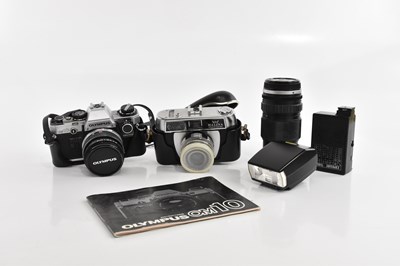 Lot 1696 - Two cameras including Olympus OM10, and a...