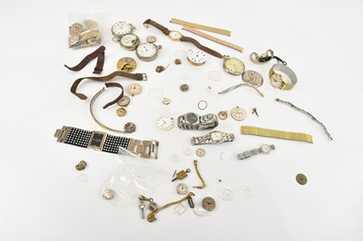 Lot 1542 - A collection of watch parts including...