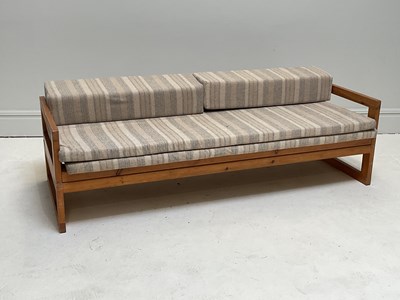 Lot 1019 - A mid century pitch pine day bed, length 195cm.