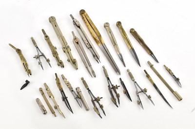 Lot 1345 - A group of four brass and steel dividers,...