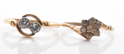 Lot 538 - A yellow metal two stone diamond crossover...