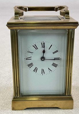 Lot 664 - An early 20th century brass carriage clock,...