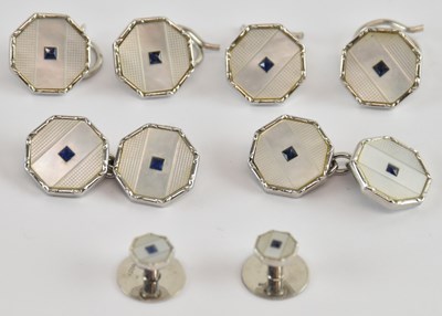 Lot 1317 - A cased set of 9ct white gold and enamelled...