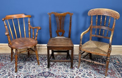 Lot 2996 - A George III provincial oak chair, the pierced...