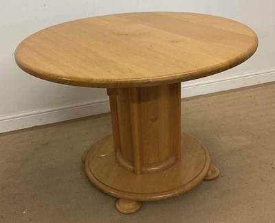 Lot 806 - SMALLBONE; a light oak circular table, the top...