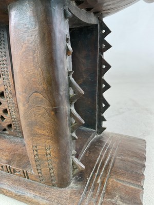 Lot 5 - A Ghanaian Ashanti stool, with typical dished...