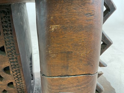 Lot 5 - A Ghanaian Ashanti stool, with typical dished...