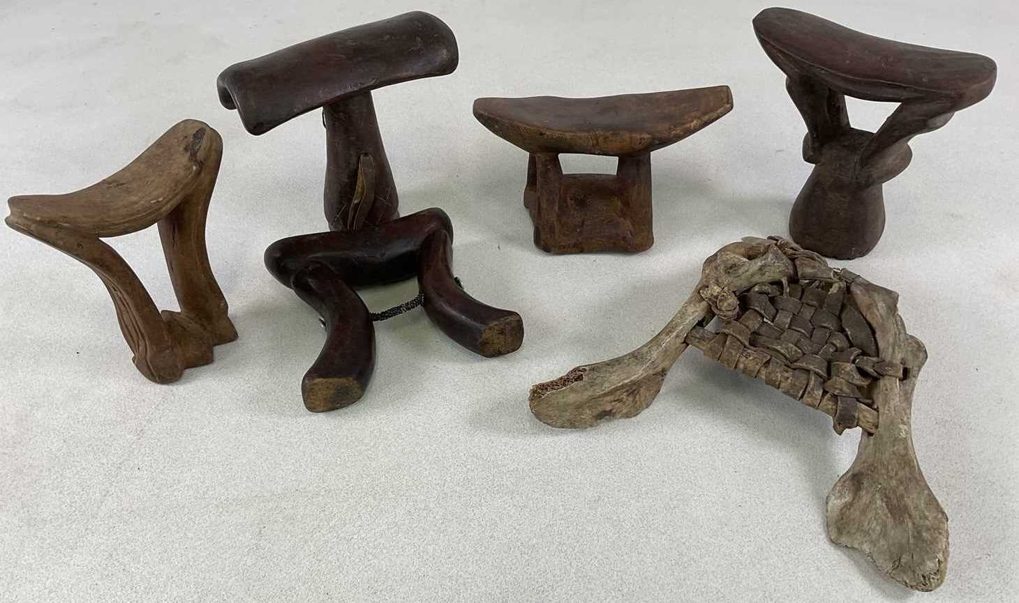 Lot 6 - Six African tribal headrests including a...