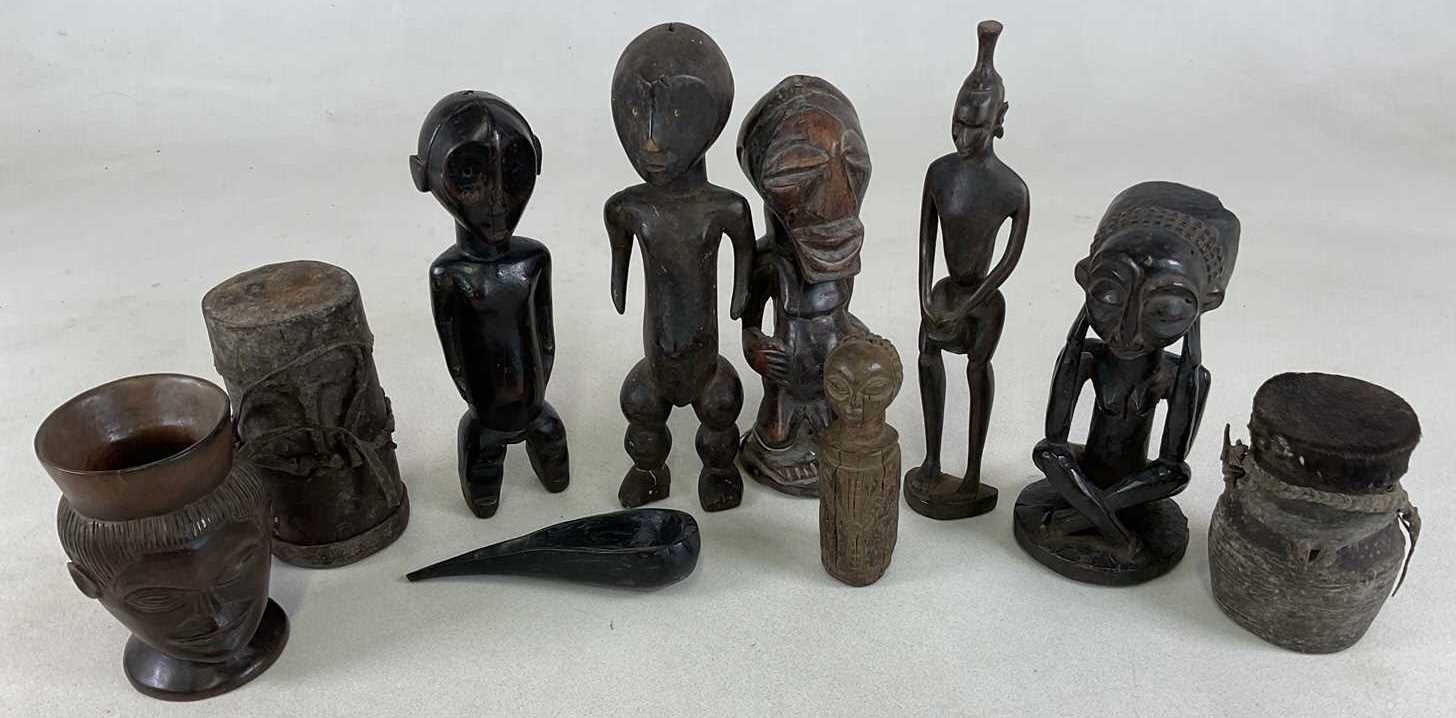 Lot 4 - A group of African tribal items including five...