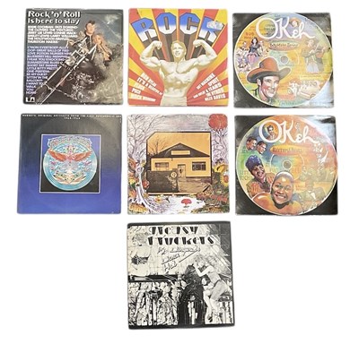 Lot 378 - Seven various records and albums including...