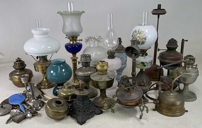 Lot 668 - A collection of various oil lamps, Tilley...