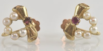 Lot 1310 - A pair of vintage 9ct gold earrings, with half...