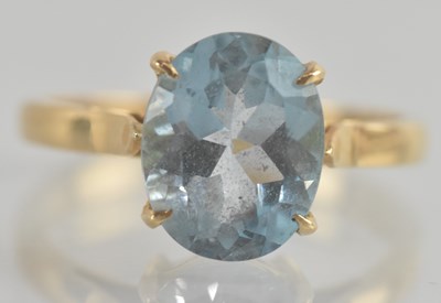Lot 1249 - An 18ct gold dress ring, with claw set cut...