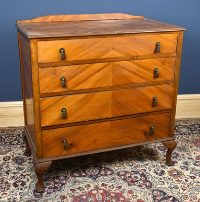 Lot 2929 - A 1930s walnut chest of four drawers on...