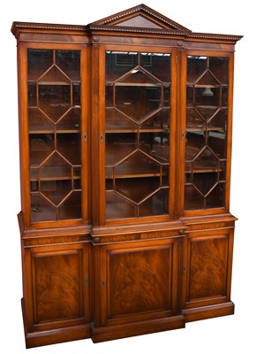 Lot 3037 - A reproduction mahogany breakfront bookcase,...