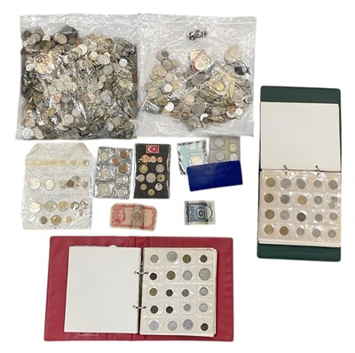 Lot 1423 - A collection of world coinage, including two...