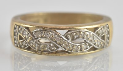 Lot 1258 - A 9ct gold white stone Celtic pattern ring,...