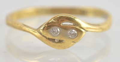 Lot 1265 - An Egyptian gold diamond set ring, the...