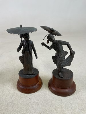 Lot 130 - A group of 20th century Thai bronze figures,...