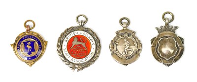 Lot 970 - Three hallmarked silver football medals,...