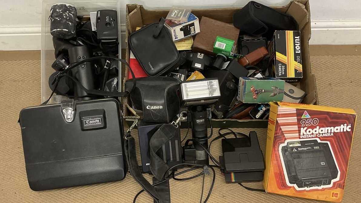 Lot 37 - A quantity of cameras and lenses; to include...