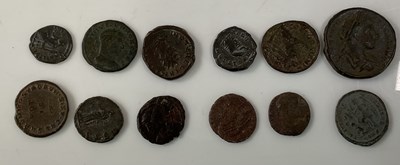 Lot 641 - A collection of twelve Roman coins to include...