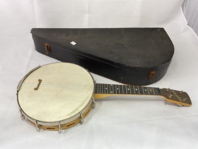 Lot 186 - RISELONIA; a cased four string banjo with...