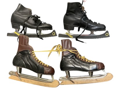 Lot 322 - Two pairs of 1950s ice skating boots,...