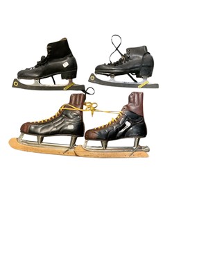 Lot 322 - Two pairs of 1950s ice skating boots,...
