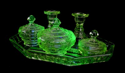 Lot 2394 - A uranium glass dressing table set comprising...