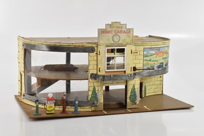 Lot 2141 - TRI-ANG; a Minic toy garage, height 25cm,...
