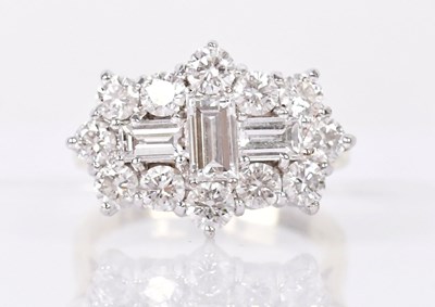 Lot 1269 - An 18ct yellow gold ring set with three...
