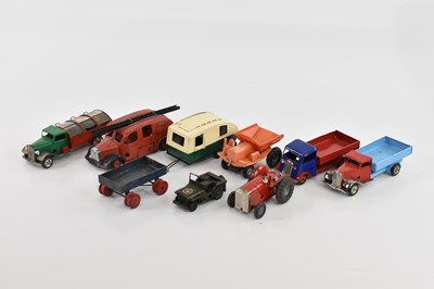 Lot 2034 - TRI-ANG; a collection of Minic toys comprising...