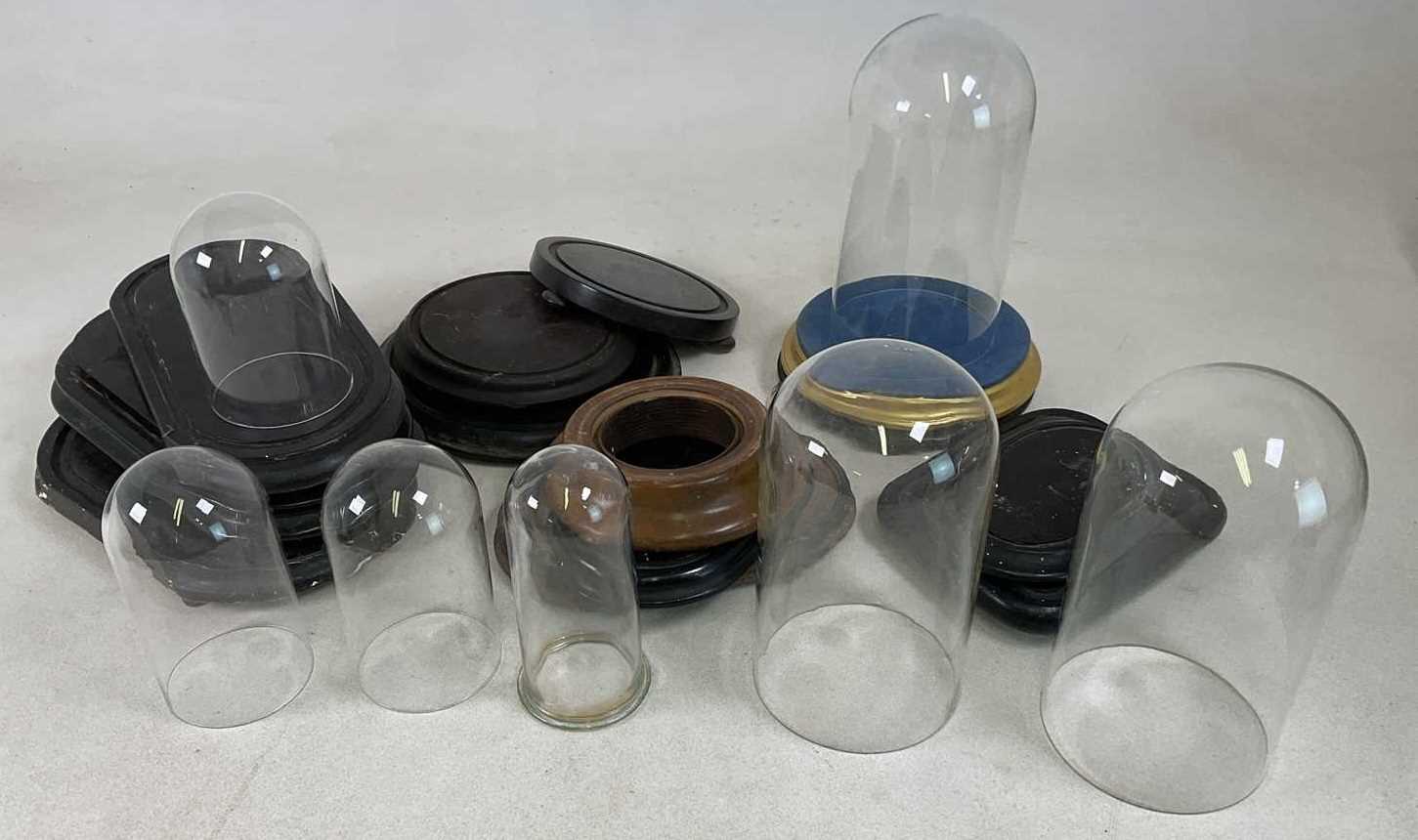 Lot 28 - A quantity of glass domes and bases, with no...