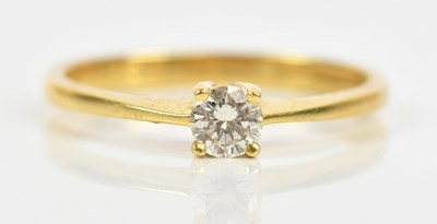 Lot 442 - An 18ct yellow gold diamond set solitaire ring,...