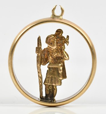 Lot 7 - A 9ct yellow gold figure of St Christopher...